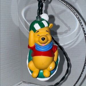 Disney Winnie the Pooh on a snow tube ornament plug in to Christmas light 90’s